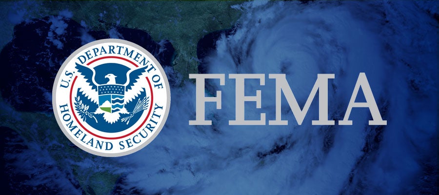 Image of hurricane with the Dept of Homeland Security logo and the FEMA logo