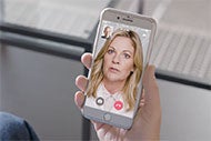 Woman on Phone Screen Virtual Care