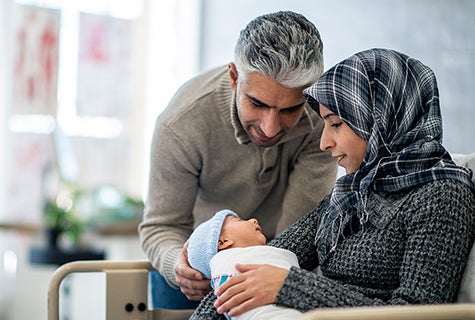 Man, woman and infant at hospital