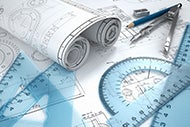 COVID-19 Reshapes How Hospitals Will Address Next Pandemic. Blueprints with rulers and compasses on them.