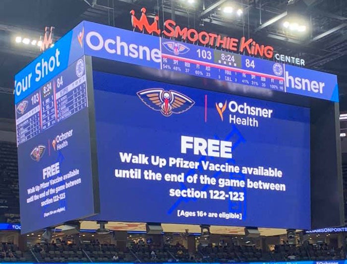 Billboard at Smoothie King Center announced free walk-up vaccination during game