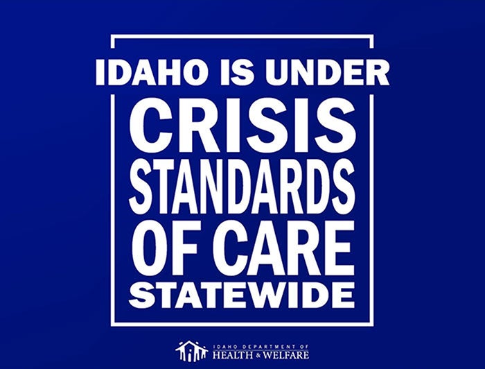 Poster reads: Idaho is under crisis standards of care statewide