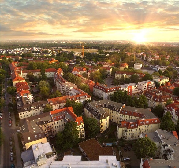 aerial shot of a community of homes at sunset