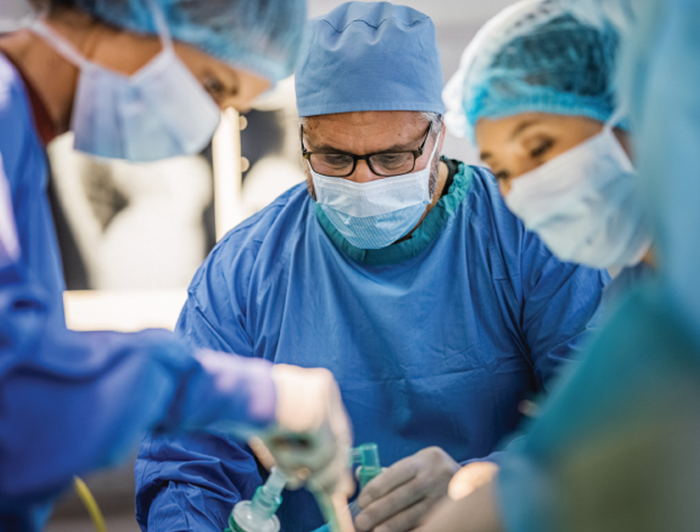 stock image of surgeons in operating theater