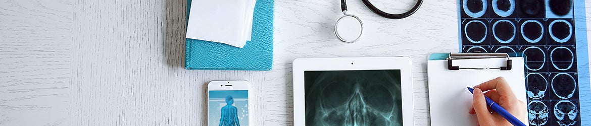 Certification Center. A book, a stethoscope, a CT scan, a mobile phone, a tablet, and a hand writing on a form on a clipboard.