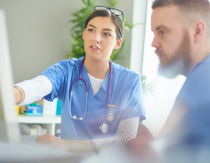 Nurses reviewing information