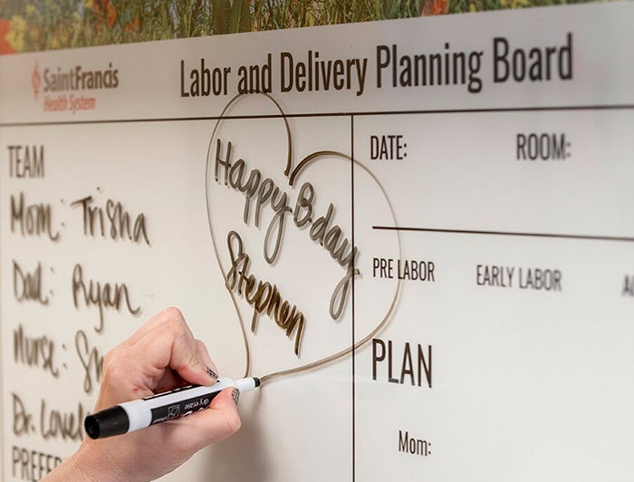 Hospital whiteboard in labor and delivery room