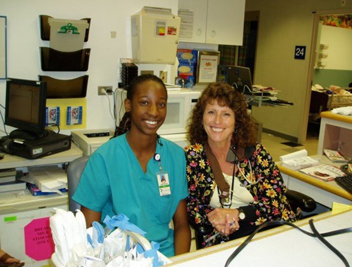 Two medical staff smiling 