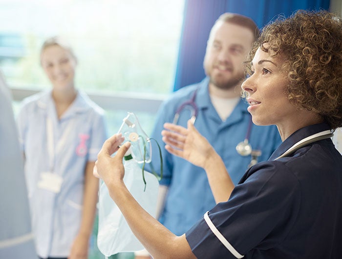 Medical personal presenting PPE