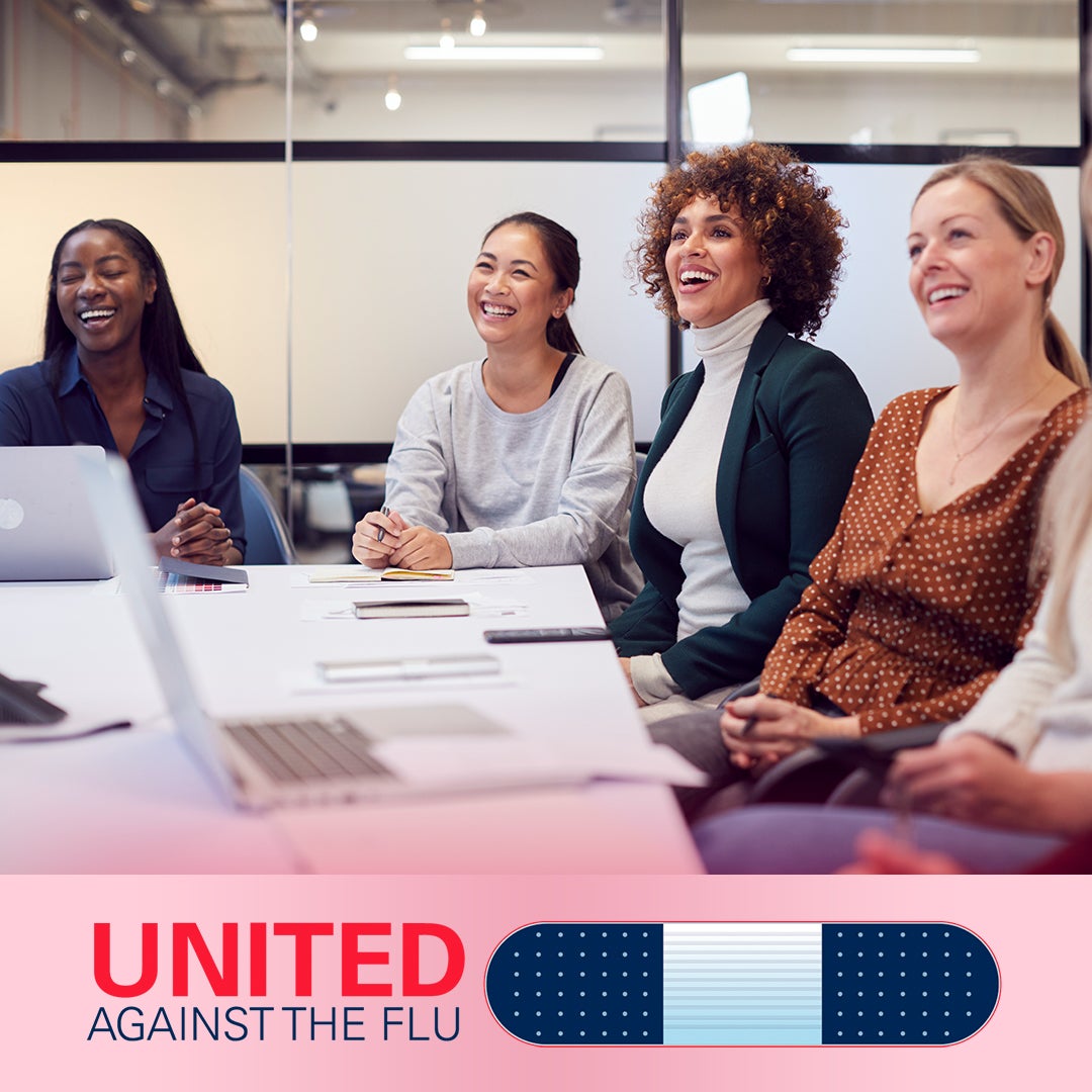 united against the flu logo below image of four diverse women sitting at a conference table smiling