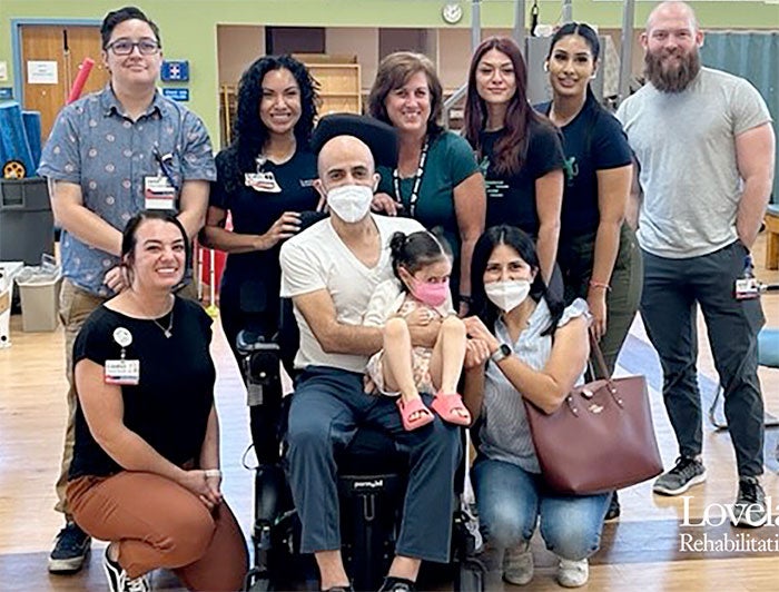 Telling the Hospital Story: Lovelace UNM Rehabilitation Hospital. Lovelace patient Cesar Colmenero and family pose with Lovelace staff