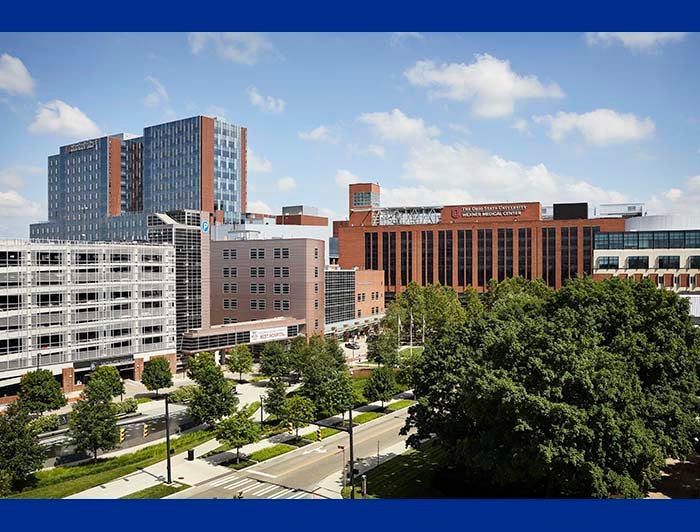 Ohio State University Wexner Medical Center exterior shot of facility against a cloudy blue sky