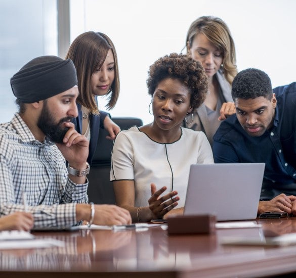 People looking at a computer screen