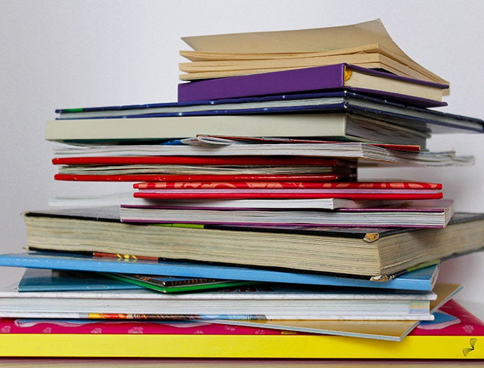St. Vincent Healthcare. Stock image of a stack of Books