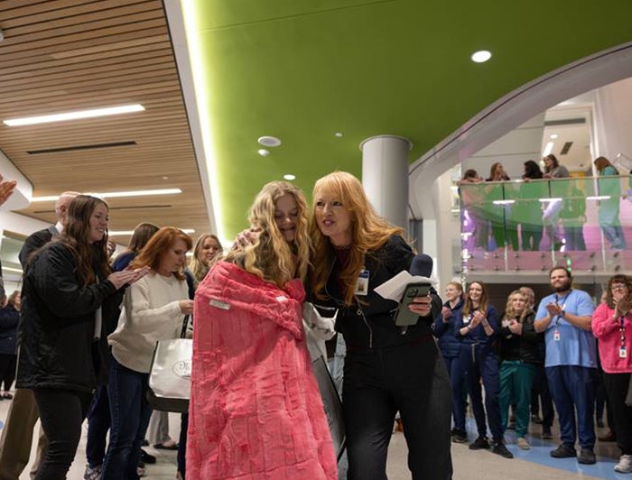 Intermountain Primary Children's. Donate Life flag is unfurled at the flag raising ceremony.