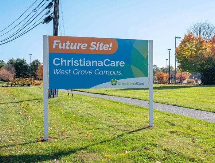 ChristianaCare and Lehigh Valley Health Network. Sign staked in grass indicates the site of new ChristianaCare West Grove campus