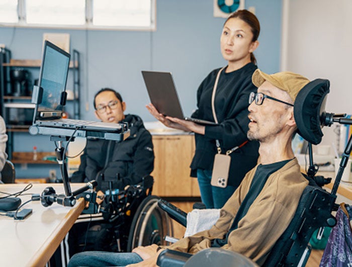 Telling the Hospital Story. UC Davis Health-Developed Technology Translates Brain Signals into Speech with 97% Accuracy. A clinician works with a patient using technology that converts brain signals to speech using laptop computers.