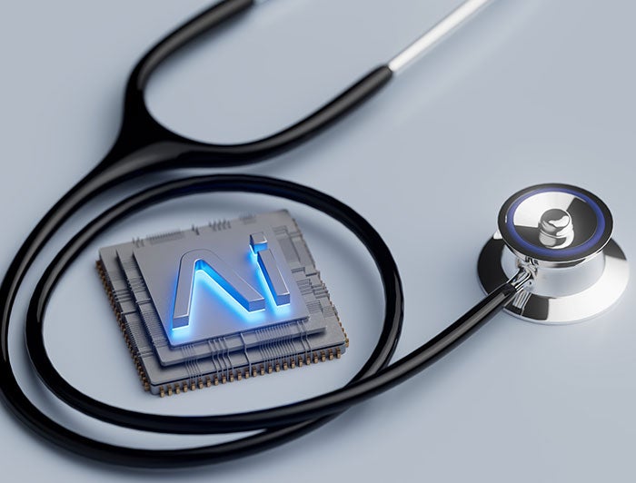 Beth Israel Deaconess Medical Center. Stock image of stethoscope coiled around computer chip bearing glowing AI symbol