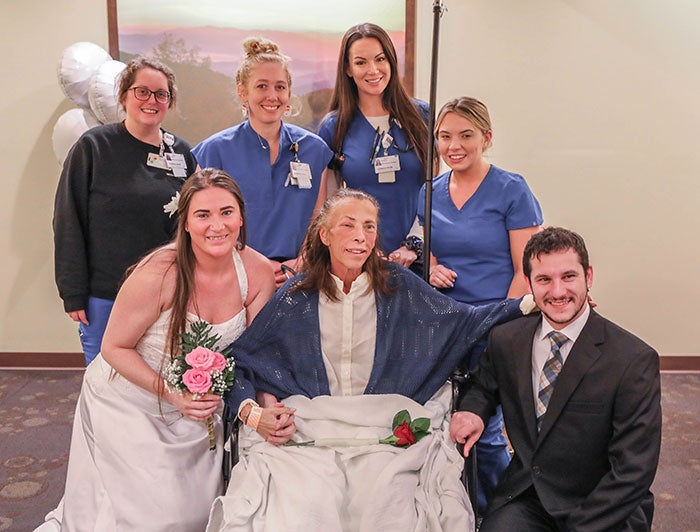 University of Tennessee Medical Center. Front, from left: Samantha  Barry, Lynn Barry and Phillip Bastelica; Rear: University of Tennessee Medical Center nurses