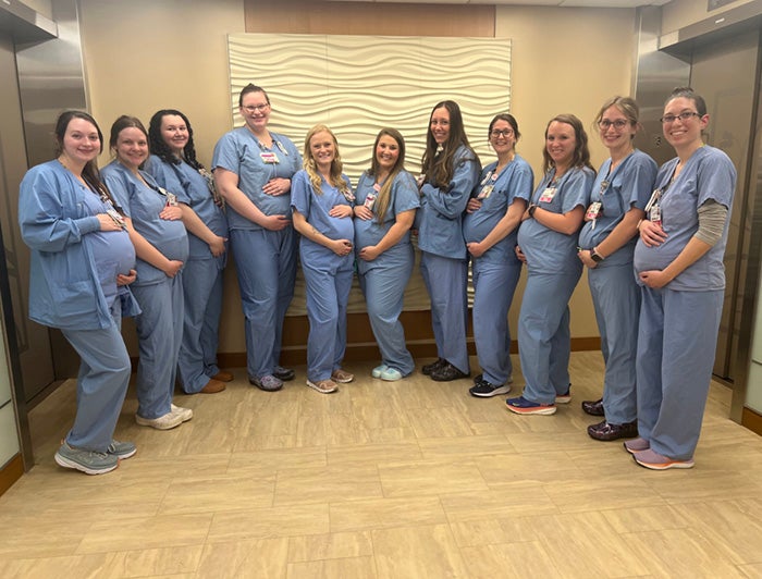 Telling the Hospital Story. 14 St. Vincent Hospital labor and delivery nurses experience their own baby boom