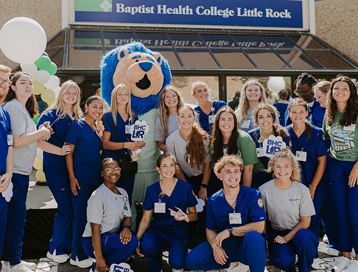 Telling the Hospital Story: New college mascot encourages future health care leaders. Baptist Health College Little Rock students pose with mascot