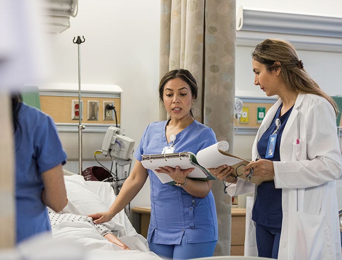 Medical residents learning in a hospital setting