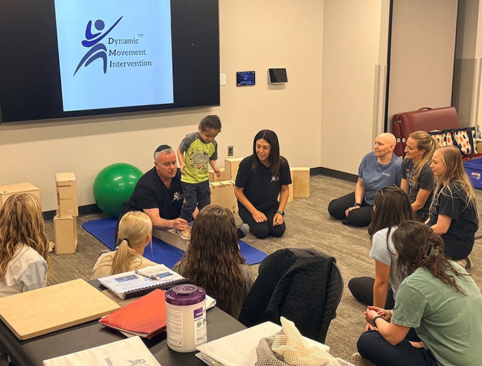 Sanford Children's therapists and patients in a Dynamic Movement Intervention presentation