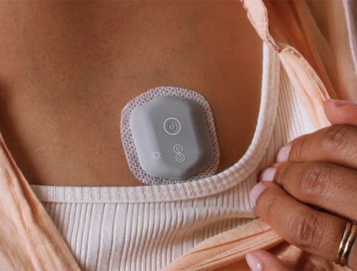 A patient wearing a biobutton.
