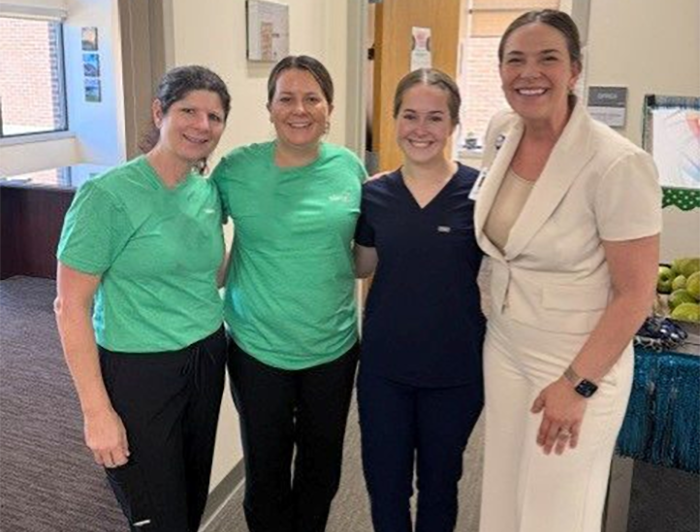 Mercy Hospital Washington leaders Connie Wissbaum, Elizabeth Gillam and Marie Moore with the first apprentice Riley Snider