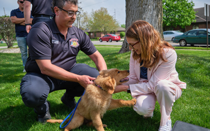 Community Crisis Response. Goshen (Indiana) Mobile Integrated Health program brings a therapy dog named Mindy with her trainer to meet a patient.