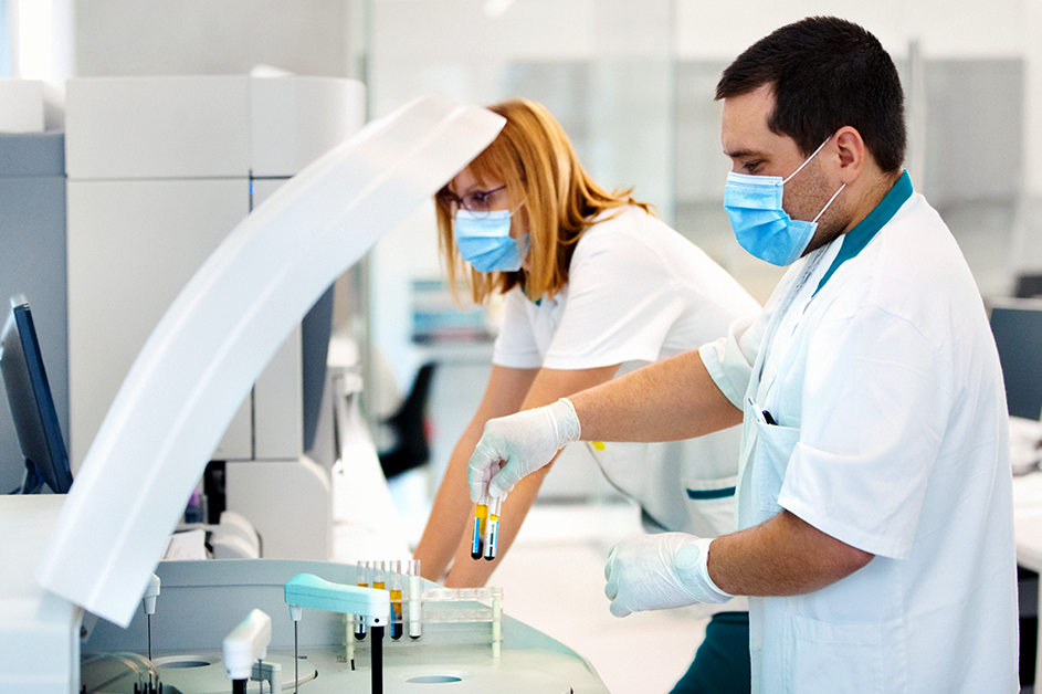 Innovation. Researchers in a lab testing blood samples.