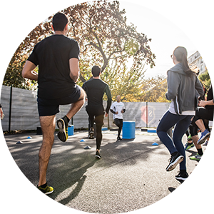 Members of a community are exercising together in a public space.