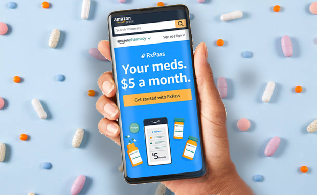 The Latest Shakeup in the Prescription Drug Market: $5 Generics via Amazon Prime. A hand holding a mobile phone with the Amazon.com page for RxPass: Your meds. $5 a month in front a background or various prescription drugs.
