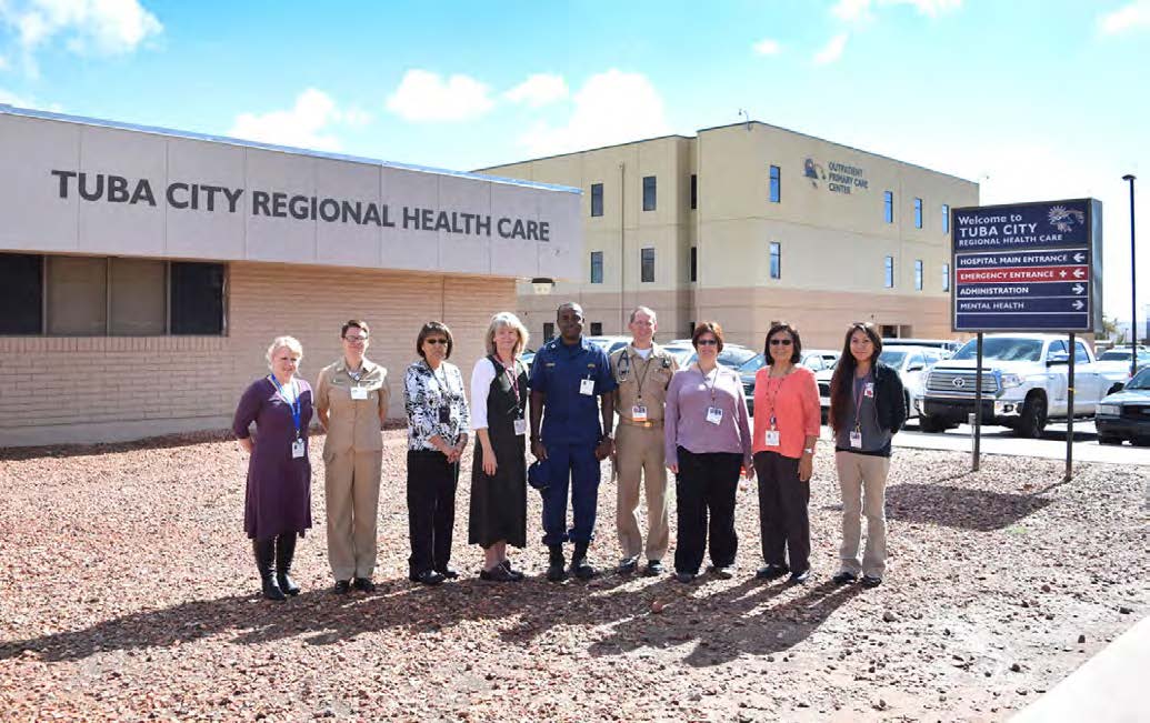 Tuba City Regional Health Care Corporation, Arizona. Staff stand outside of Tuba City Regional Health Care facility in Arizona.