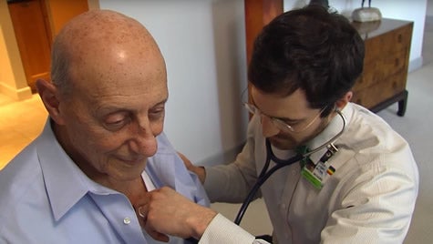 Doctor with elderly patient