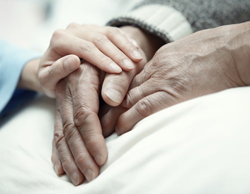 Seniors holding hands