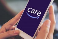 A user holds a phone with the Amazon Care app on the screen.