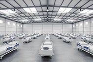 3 Important Leadership Lessons from Covid-19 Field Hospitals. Hospital beds lined up in a large, well-lit room.