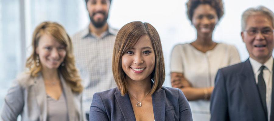 diverse business people looking at camera