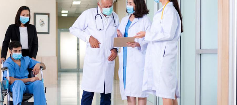 Clinicians discussing the case