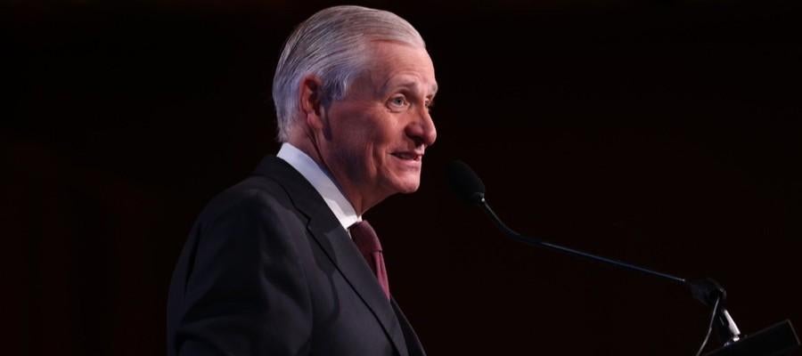 Meacham in profile on podium