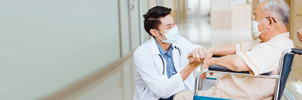doctor with patient in hall