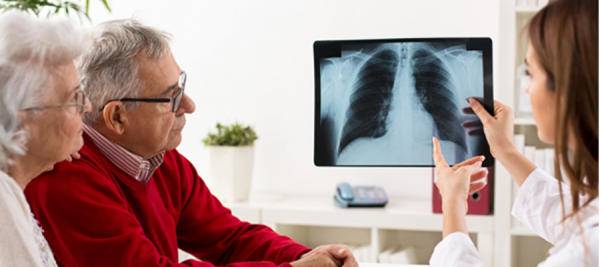 Older Couple looking at xray