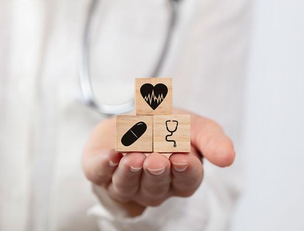 doctor-holding-blocks-700x532