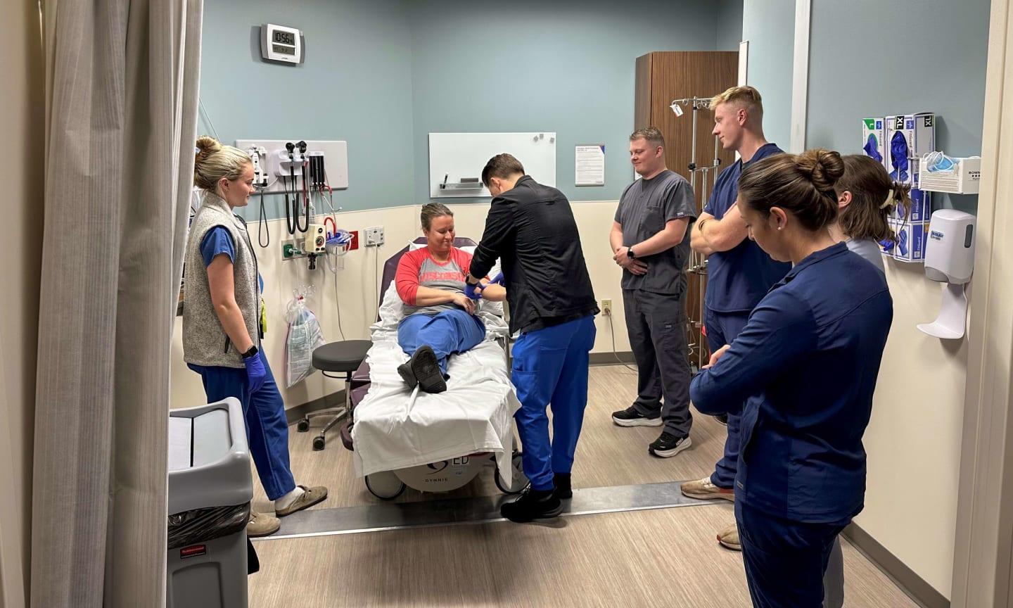 Medical personnel from the Wisconsin Air National Guard’s 115th Fighter Wing are receiving clinical training from UW Health staffers