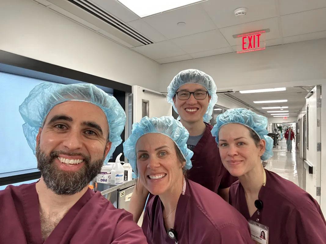 UI nephrectomy team stands in hospital hallway