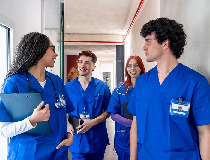 Young trainee health workers in a hallway