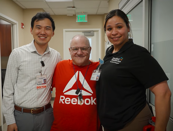 Joe Ferone with his clinicians at Hartford Hospital.