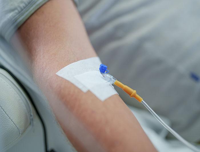 an IV line in an arm