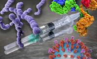 3 Advances That Could Change Patient Care. A syringe on a countertop with magnified viruses and bacteria floating above it.